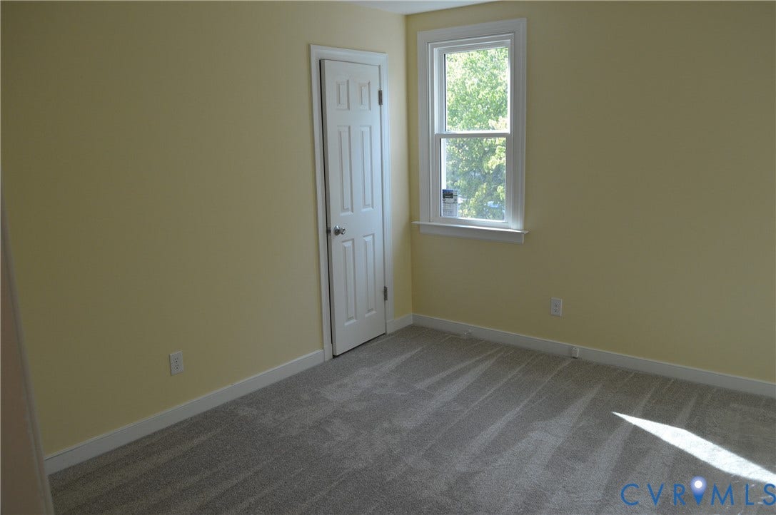 10227 Acworth Drive, Glen Allen, VA 23060 Bedroom #2 has walk up attic and carpeted flooring