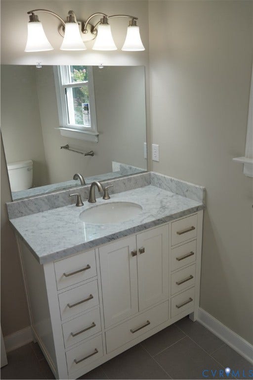 10227 Acworth Drive, Glen Allen, VA 23060 High end vanity with lots of drawers and storage and a Carrara marble countertop
