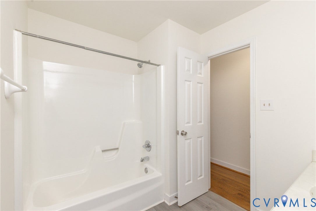 2765 Briarpatch Lane, Powhatan, VA 23139 White acrylic tub and shower combination with chrome fixtures