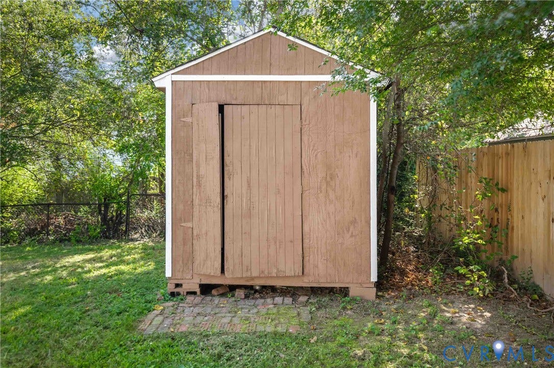 5429 Parker Street, Fulton Hill, Richmond, VA 23231 Freestanding wood-sided shed with a gable roof