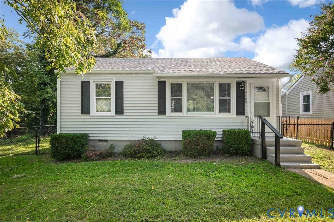 5429 Parker Street, Fulton Hill, Richmond, VA 23231 White siding exterior with a light-colored shingle roof