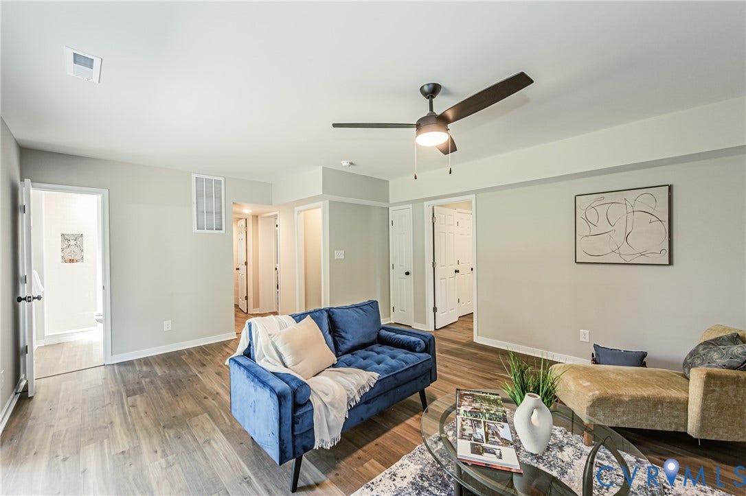 2702 Manchester Drive, New Birchett Estates, Prince George, VA 23875 Recessed lighting in a spacious room featuring wood-finish flooring and a ceiling fan with integrated illumination