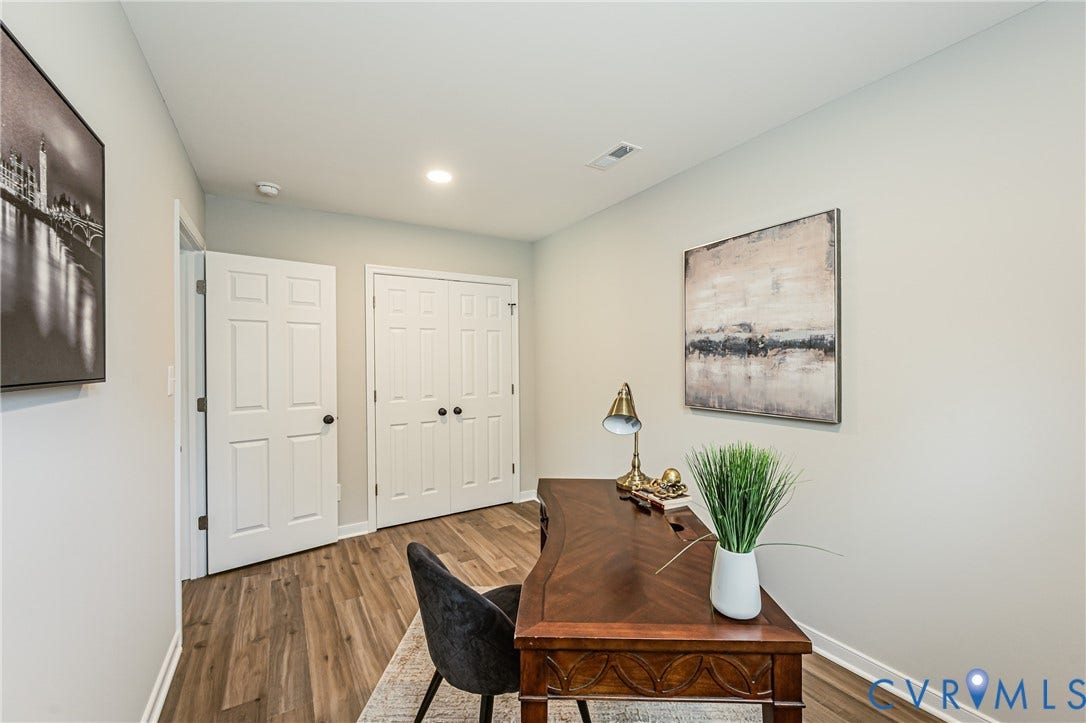 2702 Manchester Drive, New Birchett Estates, Prince George, VA 23875 Wood-finish flooring, recessed lighting, and a paneled closet door