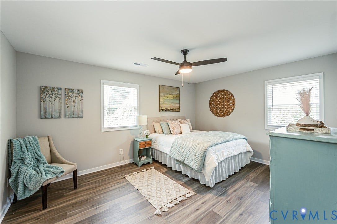 2702 Manchester Drive, New Birchett Estates, Prince George, VA 23875 Wood-finish flooring, recessed lighting, and a ceiling fan with integrated lighting