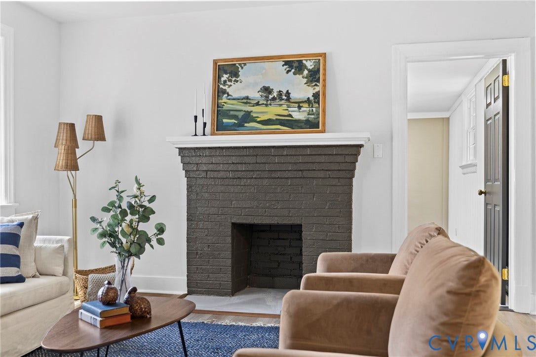 821 Fort Lee Road, North Dinwiddie, VA 23803 Brick fireplace with white mantel and hearth