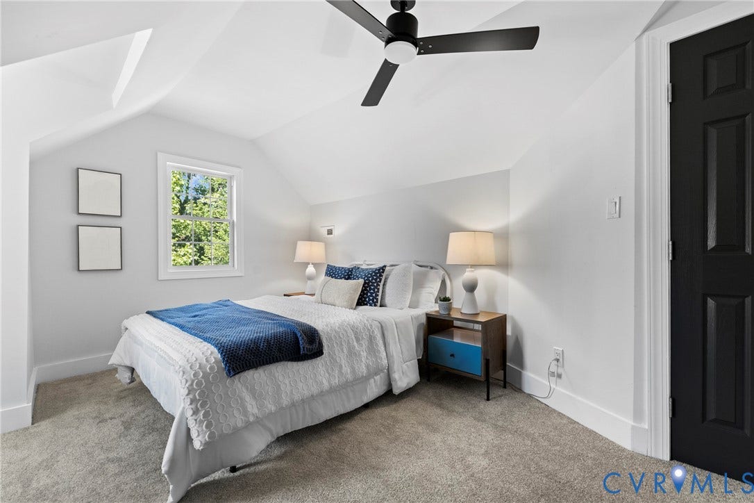 821 Fort Lee Road, North Dinwiddie, VA 23803 Sloped ceilings, window with natural light, wall-mounted light fixture, ceiling fan, and carpeted flooring