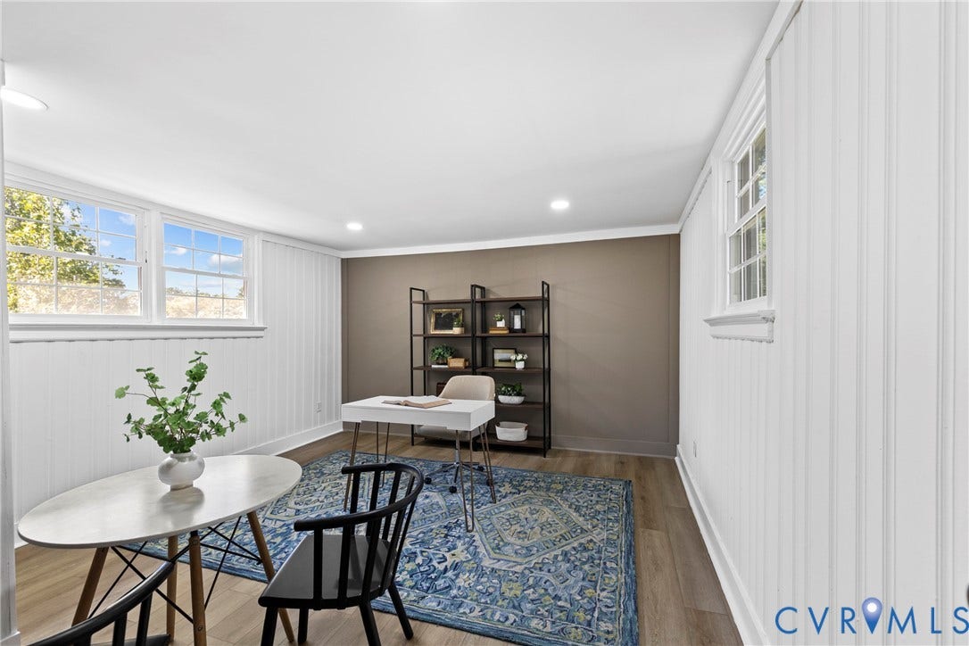 821 Fort Lee Road, North Dinwiddie, VA 23803 Recessed ceiling lighting, wood-finish flooring, white paneled wall accents, multiple windows, and crown molding