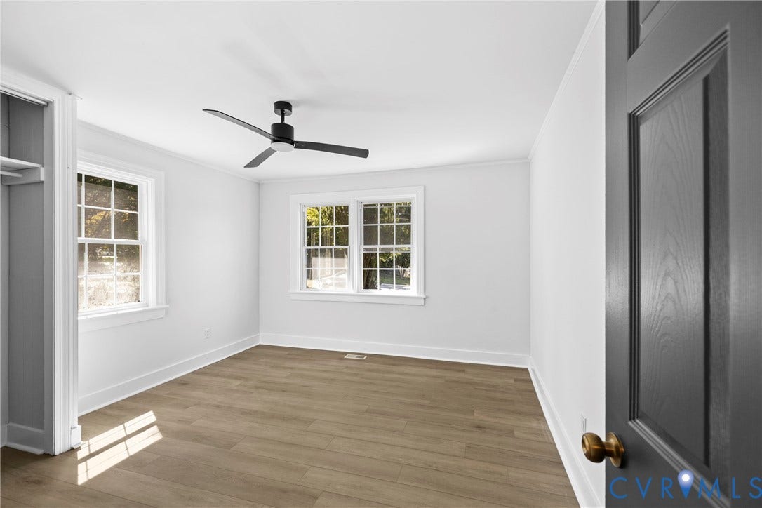 821 Fort Lee Road, North Dinwiddie, VA 23803 Clean white walls with wood-finish flooring