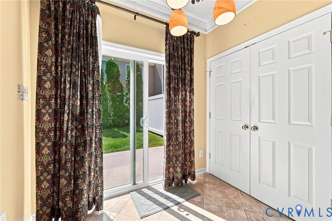 13805 Woodbridge Crossing Way, The Greens, Midlothian, VA 23112 Eat-in area with double pantry, sliding door access to patio and back yard.