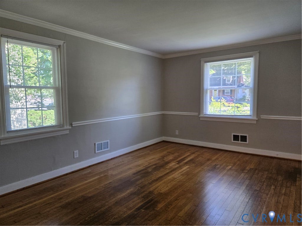3427 W Franklin Street, Museum District, Richmond, VA 23221 Hardwood flooring, painted walls, crown molding, chair rail molding, and multiple windows