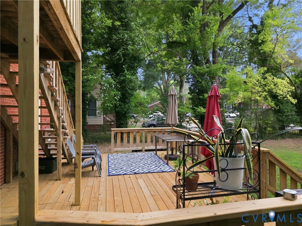 3427 W Franklin Street, Museum District, Richmond, VA 23221 Expansive wood deck with natural wood railing, featuring a lower-level deck and stairs to an upper deck