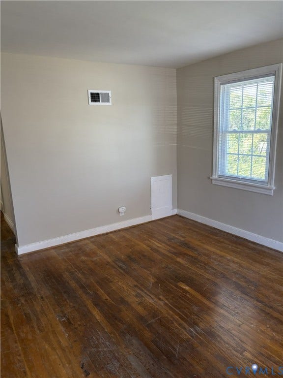 3427 W Franklin Street, Museum District, Richmond, VA 23221 Apt 2 Hardwood flooring, white baseboards, and a single window with blinds