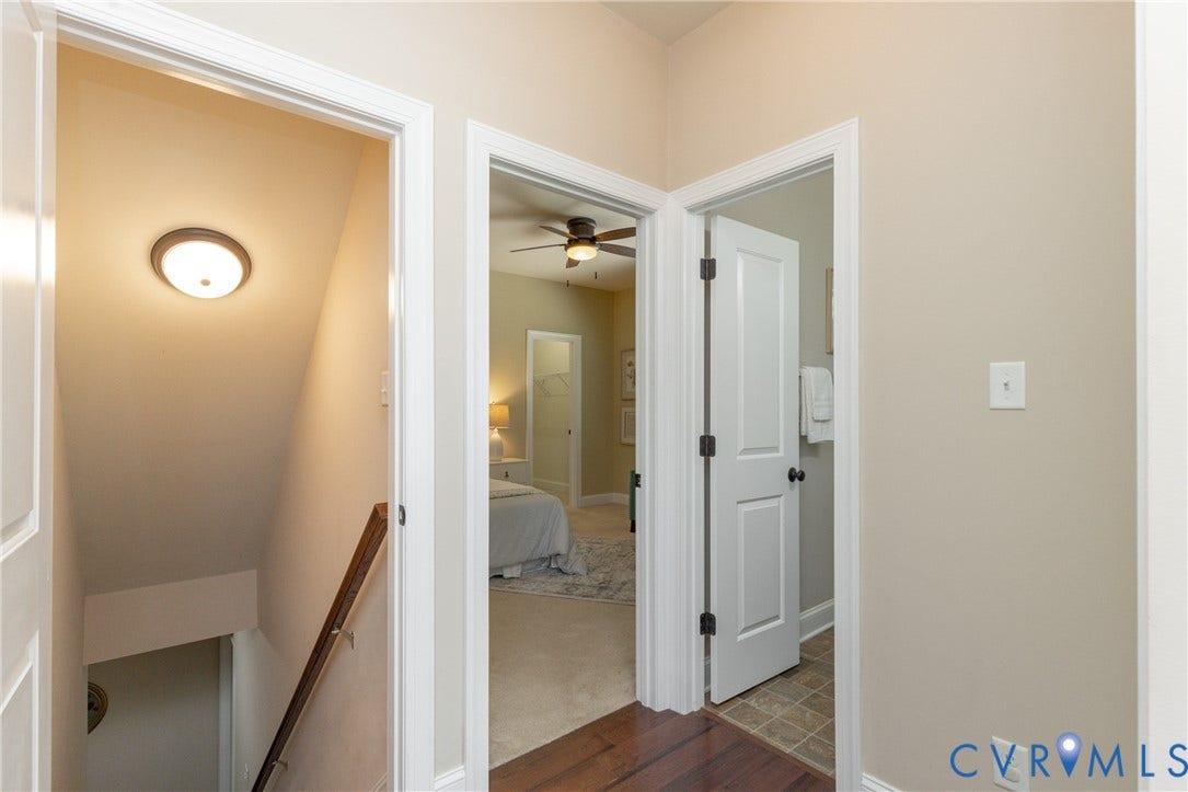 14806 Creekbrook Terrace, Brookcreek Estates, Midlothian, VA 23113 Wood-finish flooring with white trim and a neutral wall color