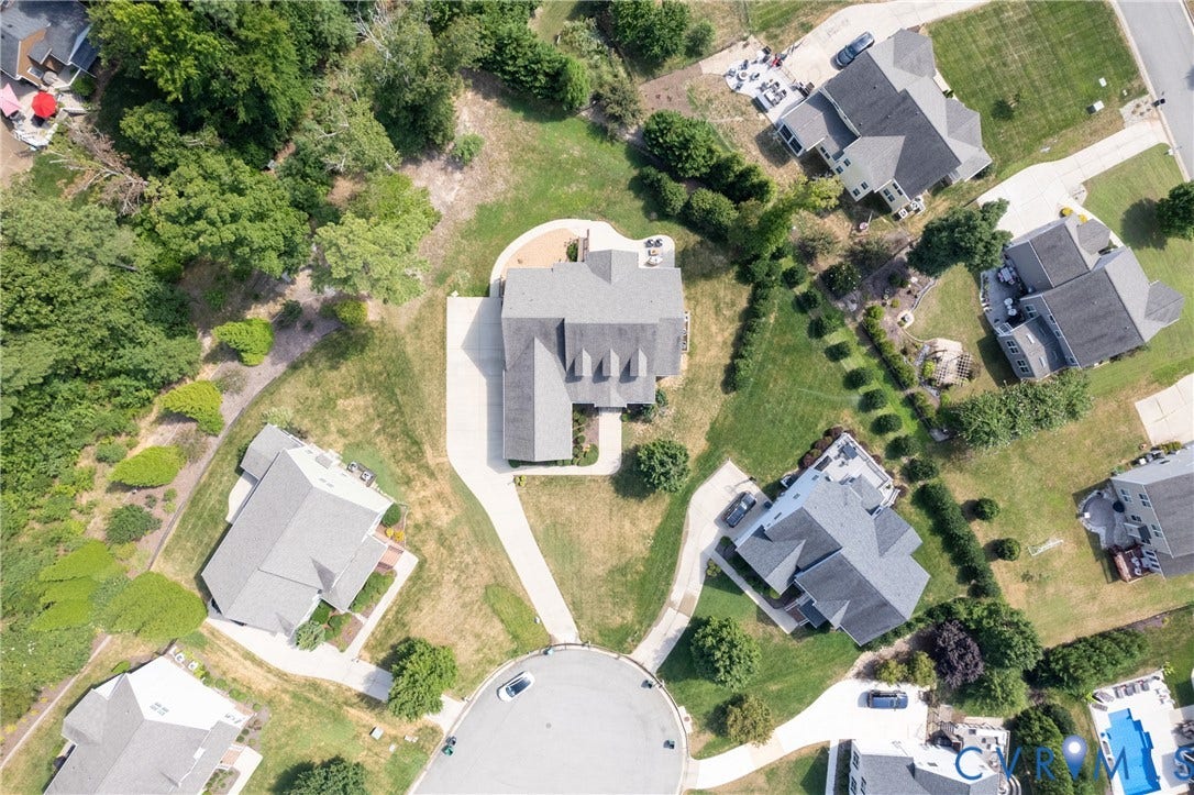 14806 Creekbrook Terrace, Brookcreek Estates, Midlothian, VA 23113 Expansive lot featuring a cul-de-sac location, paved driveway, mature trees, and a spacious lawn