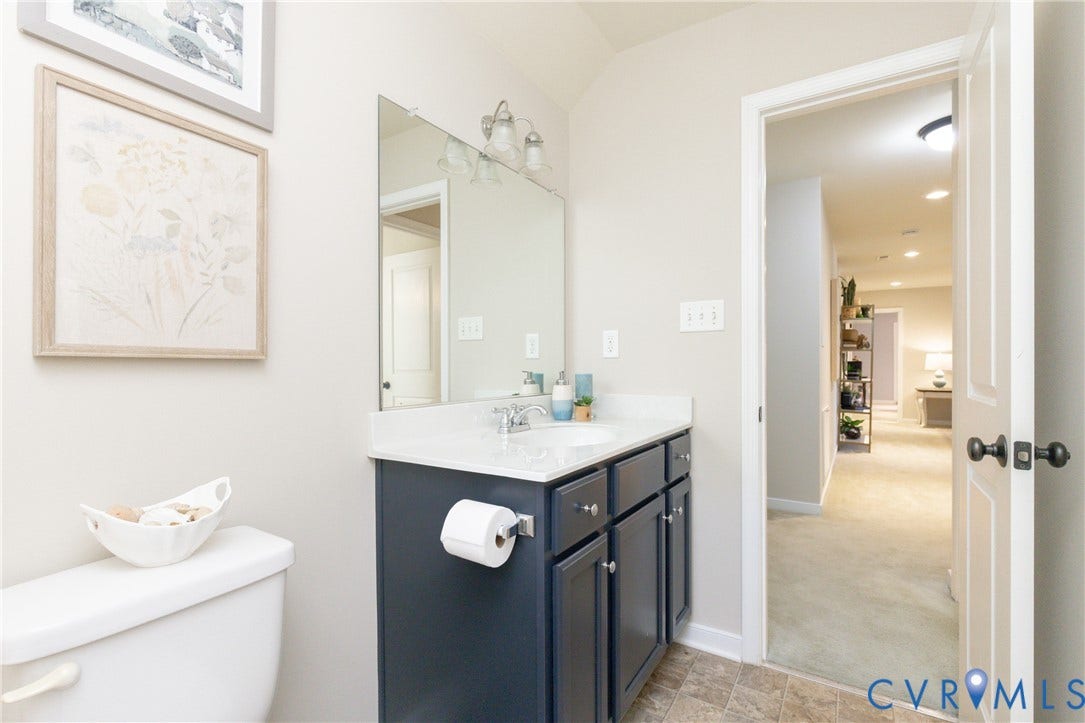 14806 Creekbrook Terrace, Brookcreek Estates, Midlothian, VA 23113 Bathroom featuring a vanity with a white countertop, undermount sink, and dark blue cabinetry
