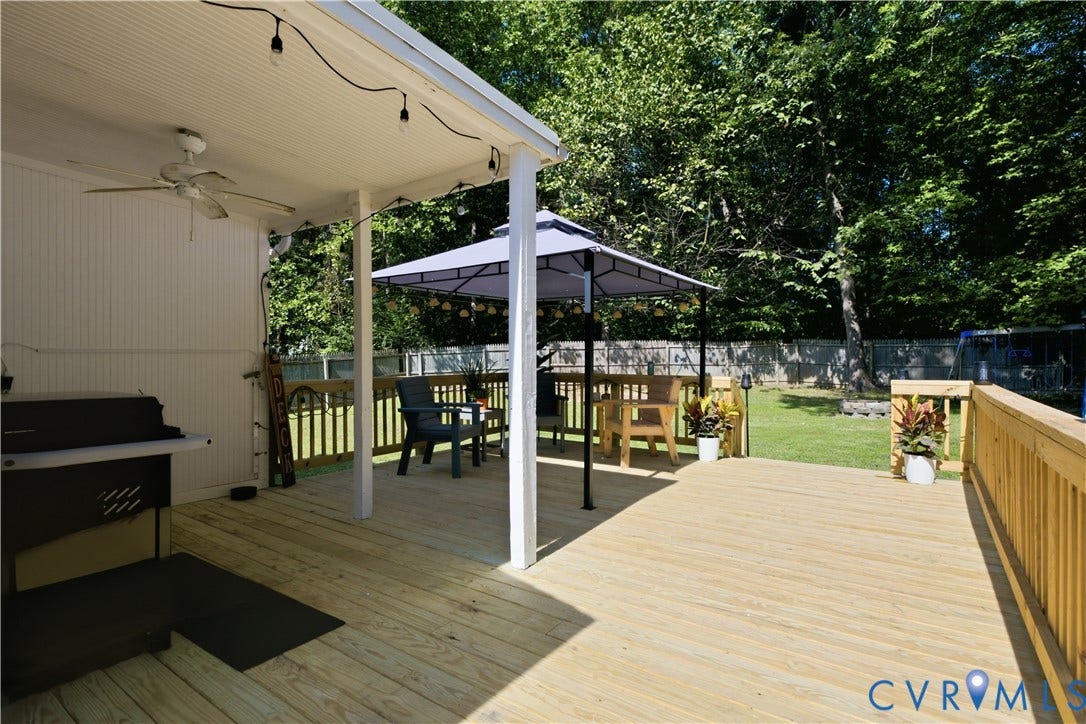 13602 Velvet Antler Place, Midlothian, VA 23112 Expansive wooden deck featuring a covered patio, ceiling fan, and string lighting