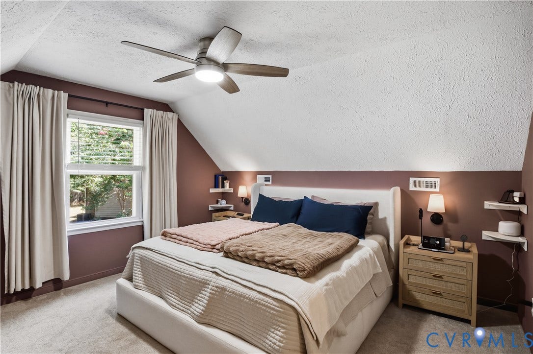 13602 Velvet Antler Place, Midlothian, VA 23112 Sloped ceiling with a ceiling fan, window with blinds, wall-mounted sconce lighting, and built-in wall shelving