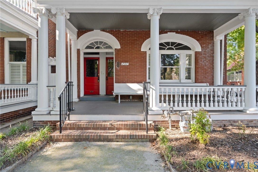 1527 Grove Avenue, #3, Richmond, VA 23220 Brick exterior with a covered porch, white balustrade, and stately columns