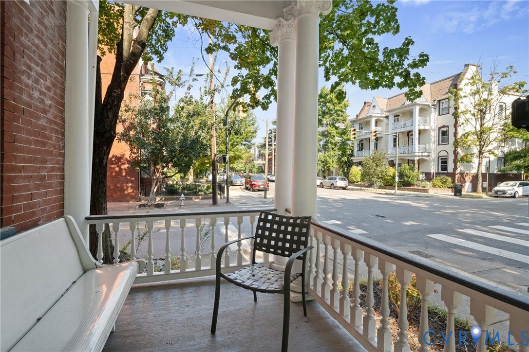 1527 Grove Avenue, #3, Richmond, VA 23220 Porch with white columns, balustrade railing, and a brick exterior wall