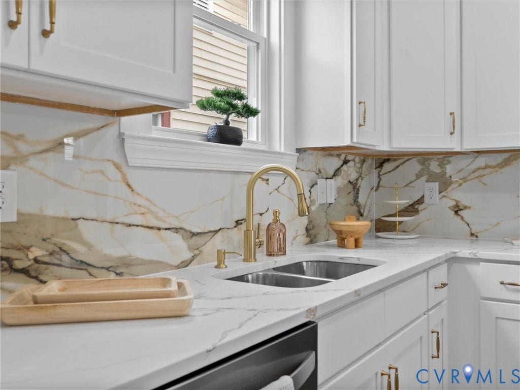 2623 Northumberland Avenue, Richmond, VA 23220 Kitchen with white cabinetry, gold-toned hardware, gold-toned faucet, double basin sink, and stone countertops