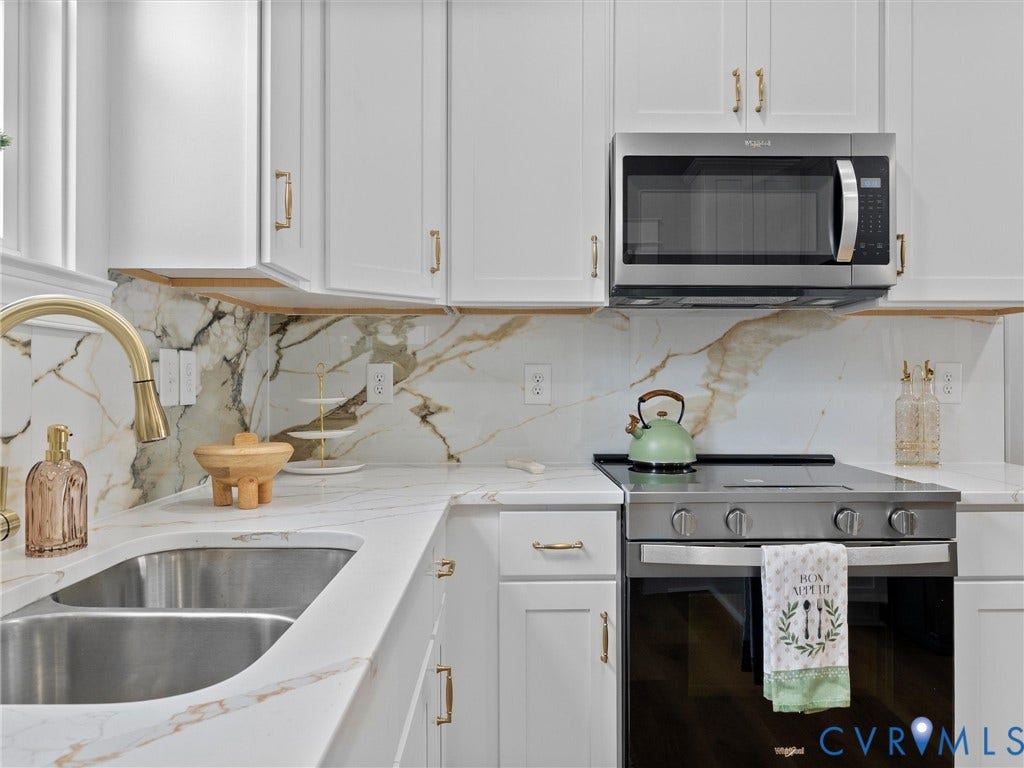 2623 Northumberland Avenue, Richmond, VA 23220 White cabinetry with gold-tone hardware