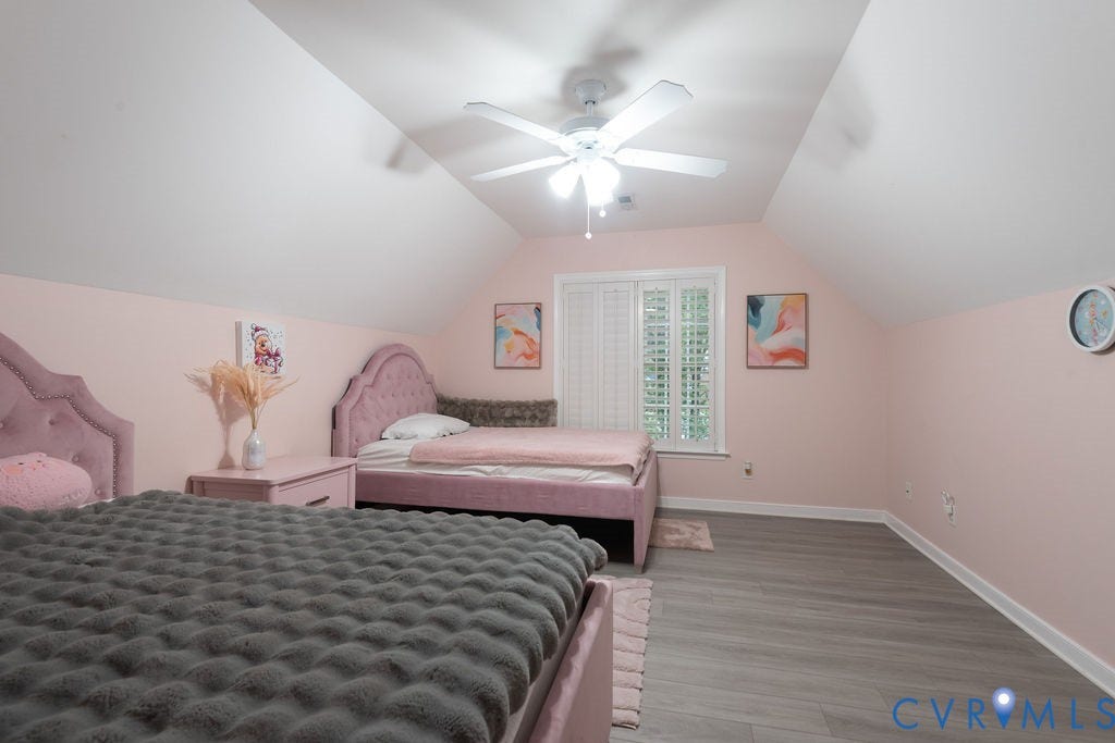 14107 Beachmere Road, Stoney Glen South, Chester, VA 23831 Sloped ceiling room featuring wood-finish flooring, a ceiling fan, and a window with white louvered blinds