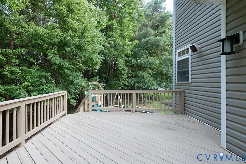 14107 Beachmere Road, Stoney Glen South, Chester, VA 23831 Expansive wood deck with railing and stairs