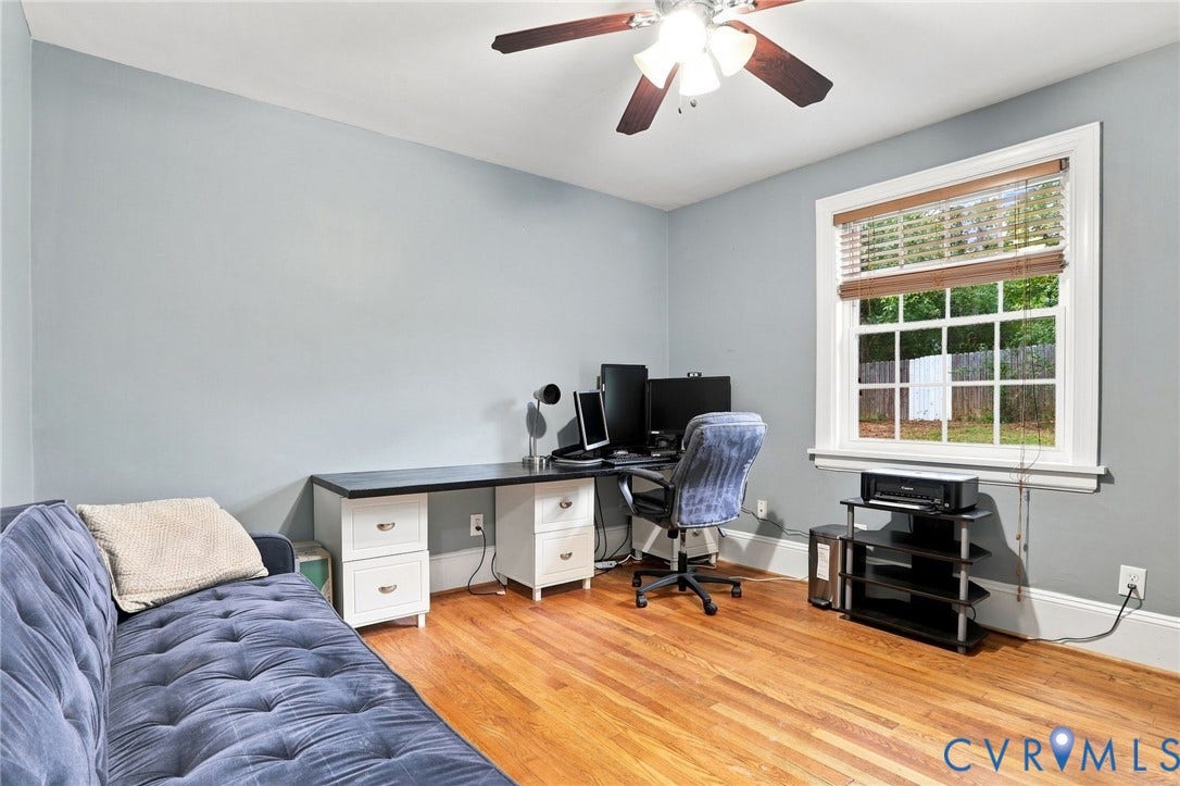 1427 Spring Grove Drive, Richmond, VA 23225 Hardwood flooring, painted walls, ceiling fan with integrated lighting, and a multi-pane window
