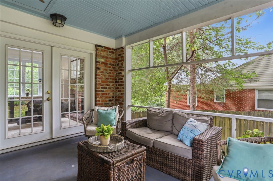 1427 Spring Grove Drive, Richmond, VA 23225 Screened porch featuring a beadboard ceiling, brick accent wall, and double glass-paned doors