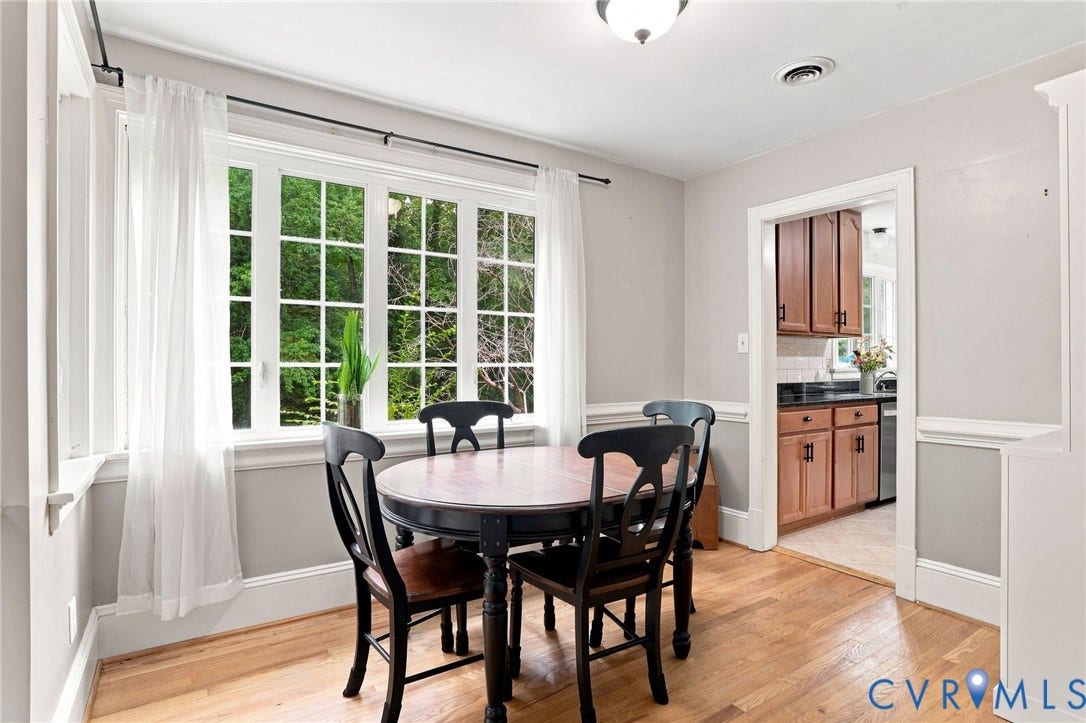 1427 Spring Grove Drive, Richmond, VA 23225 Hardwood flooring complemented by wainscoting and a multi-pane window