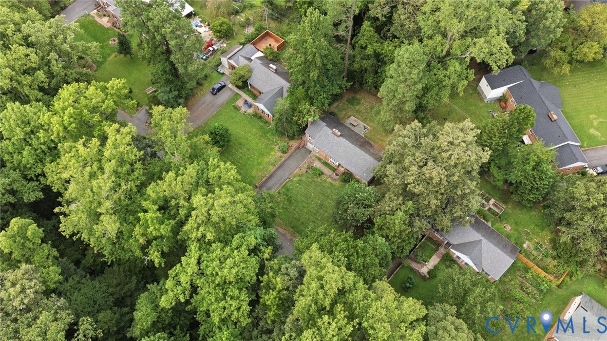 1427 Spring Grove Drive, Richmond, VA 23225 Expansive property featuring mature trees and multiple structures