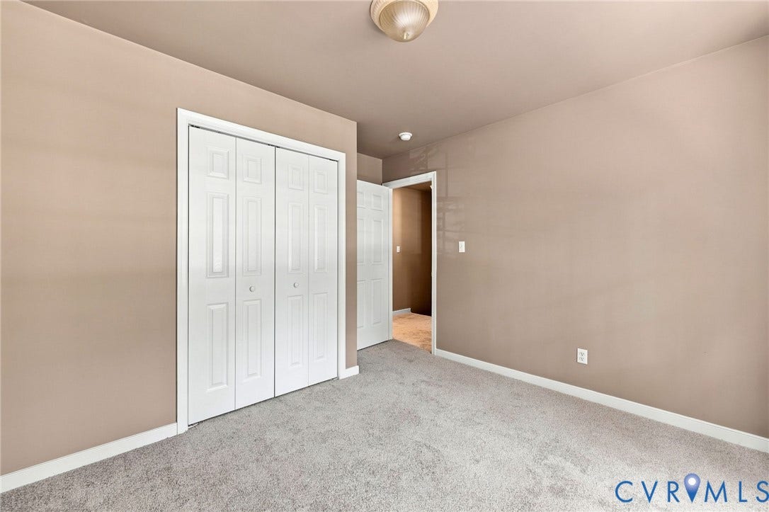 3522 Fairfield Road, Powhatan, VA 23139 Neutral-toned walls complement the gray carpeting