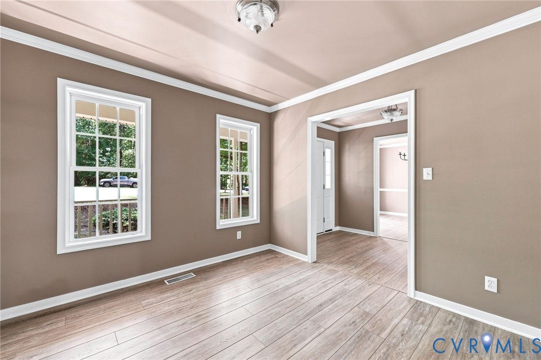 3522 Fairfield Road, Powhatan, VA 23139 Wood-finish flooring throughout, framed by white trim