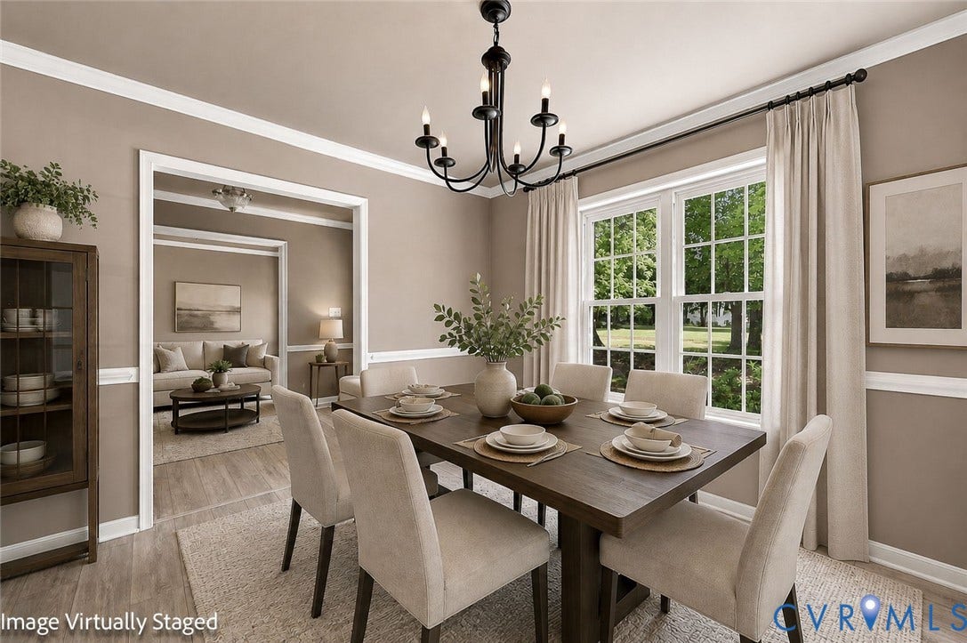3522 Fairfield Road, Powhatan, VA 23139 Virtual Staged Dining area featuring a dark wood-finish table, a multi-light chandelier, and a large window with grilles