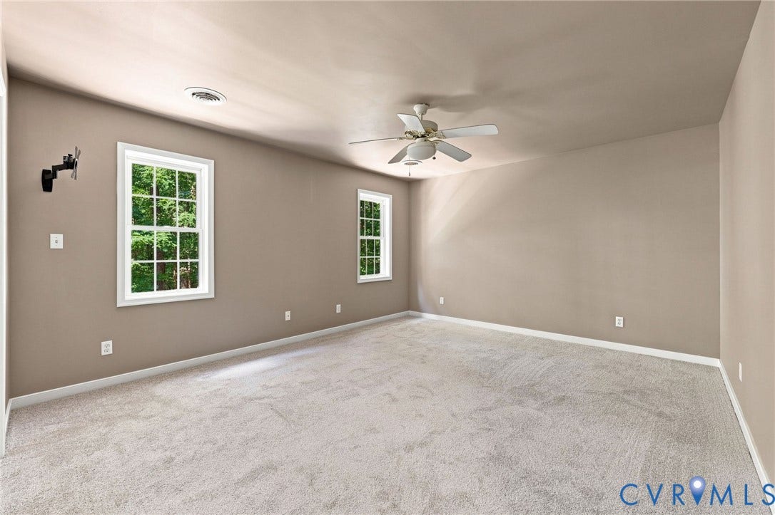 3522 Fairfield Road, Powhatan, VA 23139 Neutral wall tones, ceiling fan, carpet flooring, and white trim