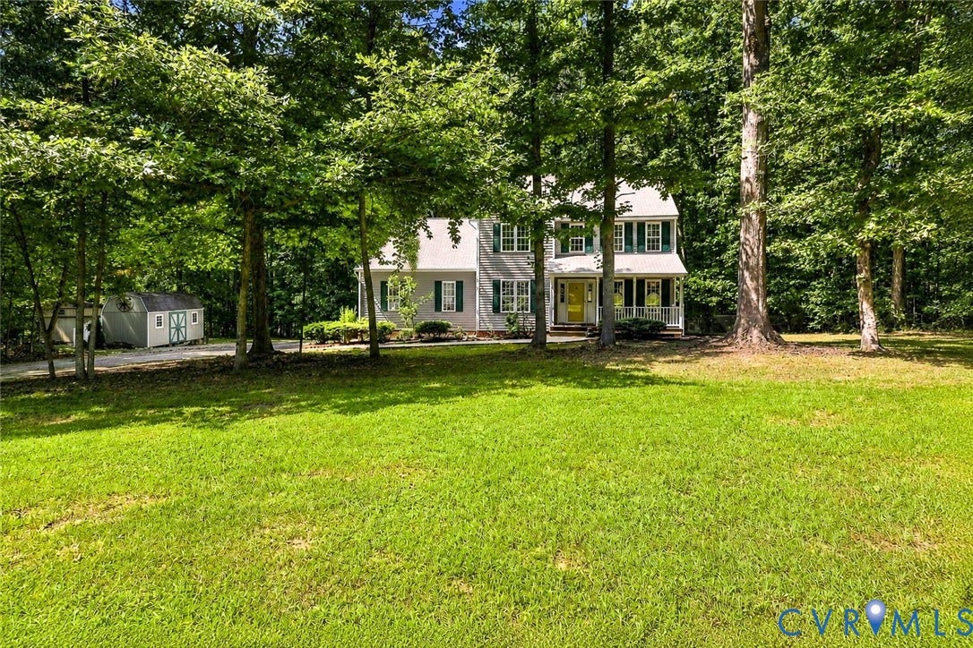 3522 Fairfield Road, Powhatan, VA 23139 Two-story residence with a covered front porch and dormer windows
