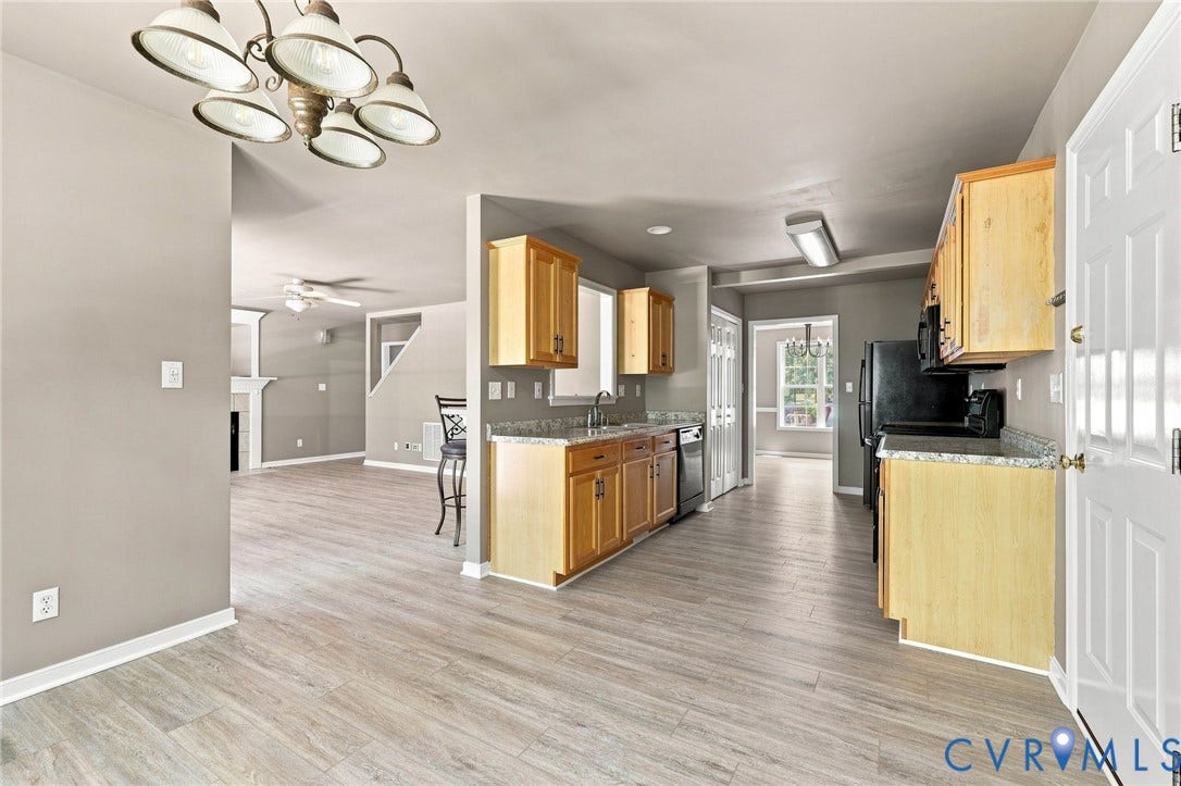 3522 Fairfield Road, Powhatan, VA 23139 Kitchen with wood-finish cabinetry and light-toned countertops