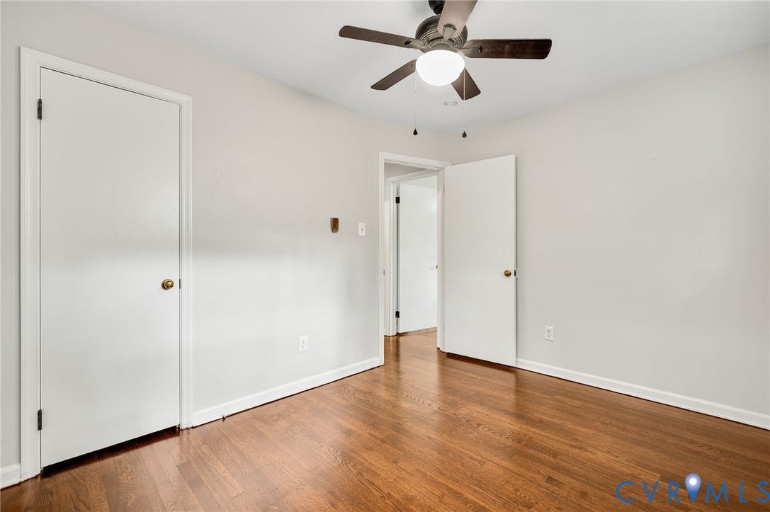 5322 Germain Road, Piney Knolls, Richmond, VA 23224 Dark wood-finish flooring with light-toned walls