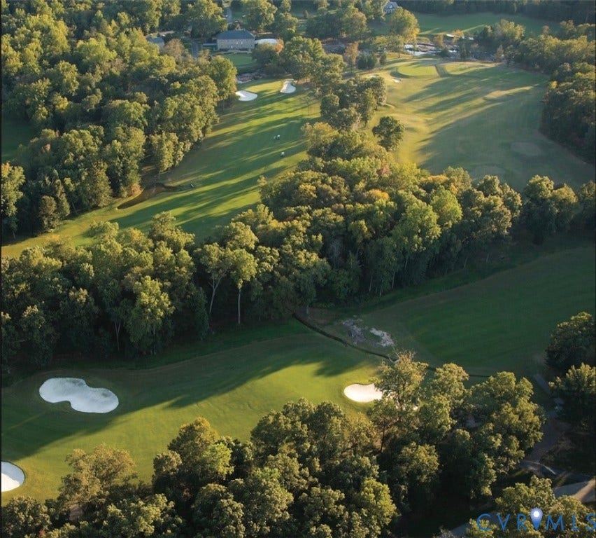 2025 Wilkhaven Terrace, Powhatan, VA 23139 Expansive golf course setting featuring manicured greens, sand bunkers, and mature trees