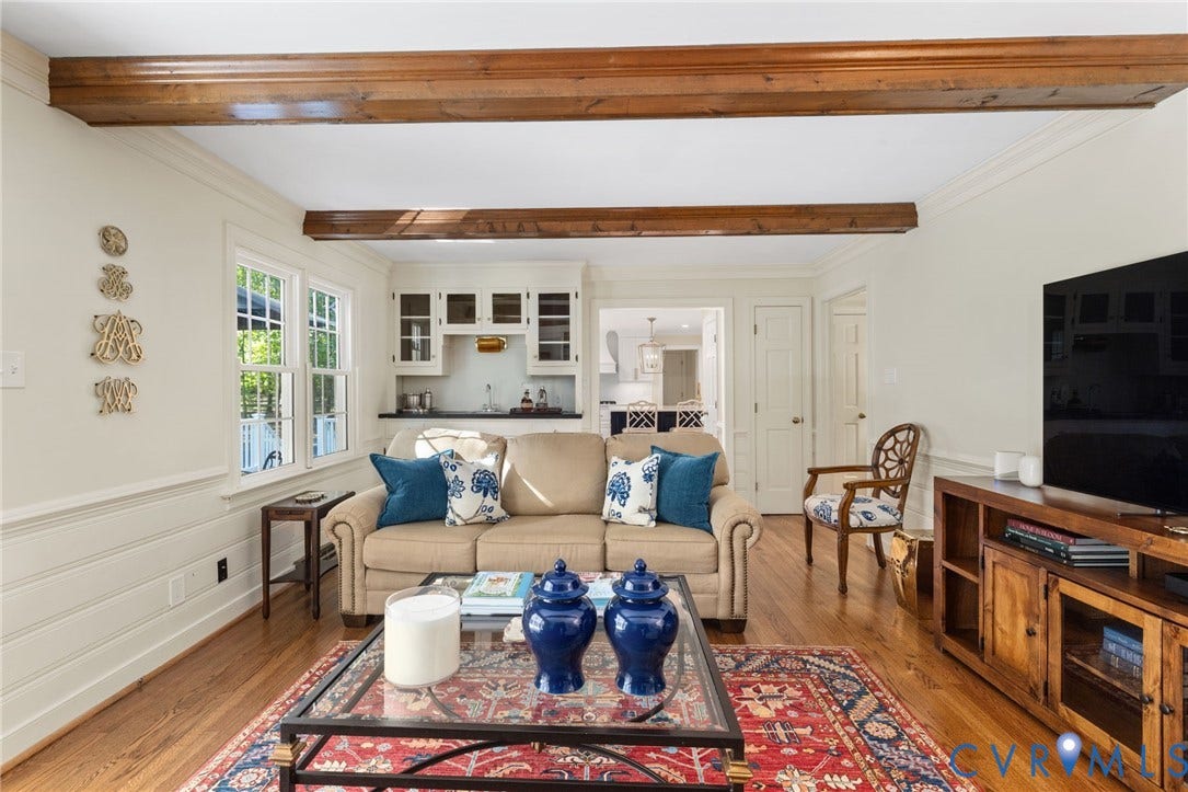 14411 Galloway Court, Salisbury, Midlothian, VA 23113 Hardwood flooring, exposed wood beams, built-in wet bar, white paneling, and double windows