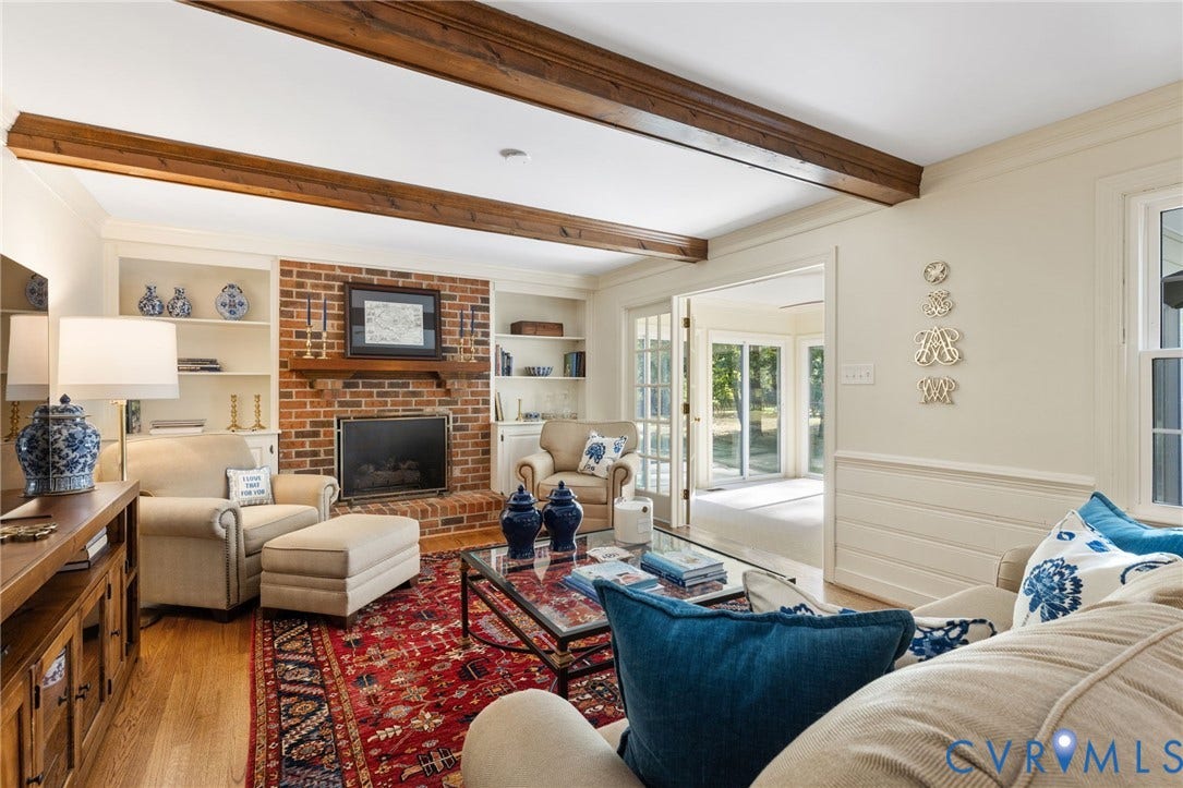 14411 Galloway Court, Salisbury, Midlothian, VA 23113 Exposed wood ceiling beams, brick fireplace with wood mantle, built-in shelving, wood-finish flooring, and French doors