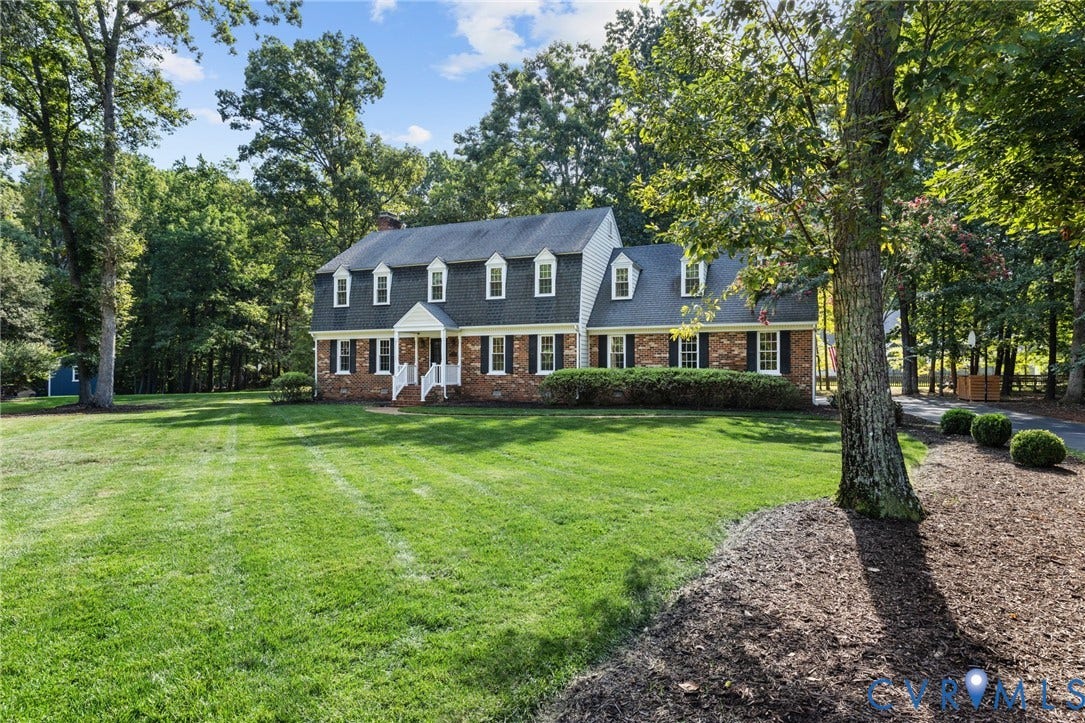 14411 Galloway Court, Salisbury, Midlothian, VA 23113 Brick exterior with white trim, a gambrel roof, and multiple dormer windows
