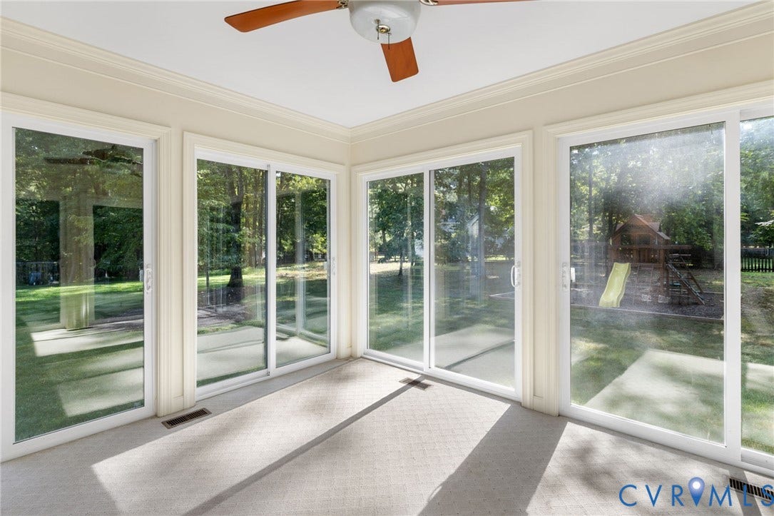 14411 Galloway Court, Salisbury, Midlothian, VA 23113 Sunroom with multiple sliding glass doors, a ceiling fan, and carpeted flooring