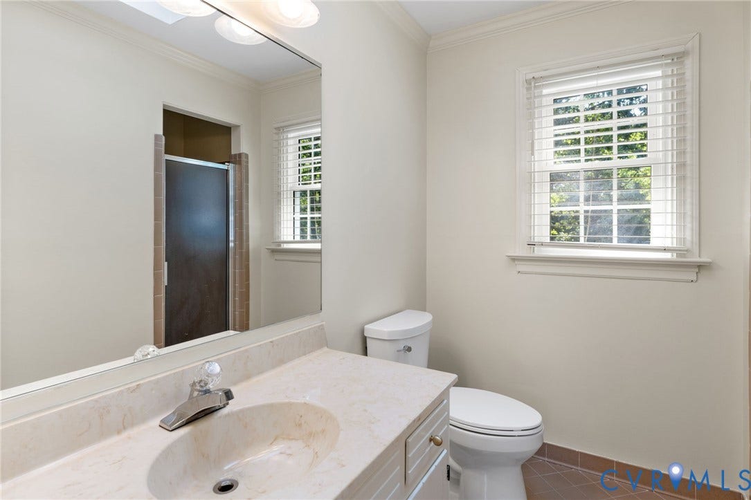 14411 Galloway Court, Salisbury, Midlothian, VA 23113 Vanity with integrated sink, full-width mirror, and overhead lighting