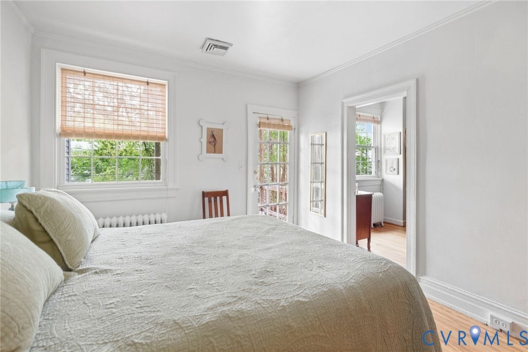 2415 Maplewood Avenue, Byrd Park, Richmond, VA 23220 Hardwood flooring, crown molding, white trim work, and a glass-paneled door