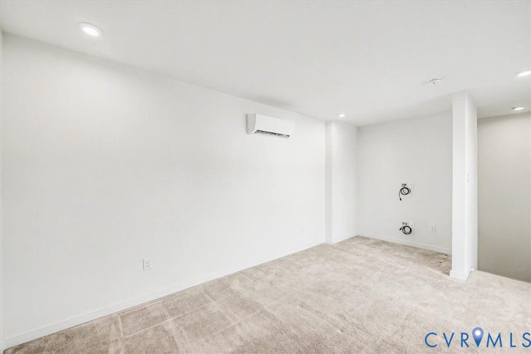 1141 Broad Hill Trace, Saunders Station Townes, Henrico, VA 23233 Recessed lighting, light-toned carpeting, white walls, and wall-mounted climate control unit