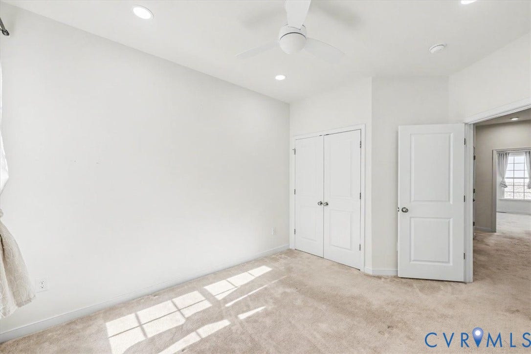 1141 Broad Hill Trace, Saunders Station Townes, Henrico, VA 23233 Recessed lighting, ceiling fan, white paneled doors, and light-toned carpeting