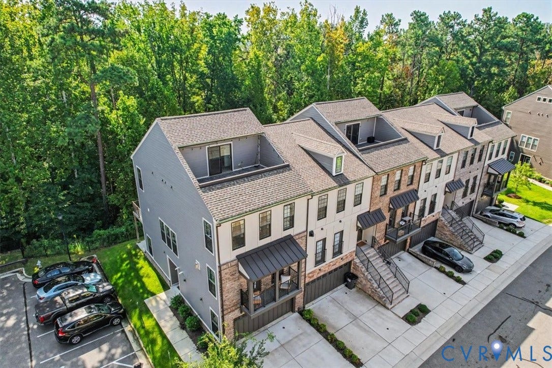 1141 Broad Hill Trace, Saunders Station Townes, Henrico, VA 23233 Contemporary townhome exterior featuring multi-level construction, durable siding, and a private balcony