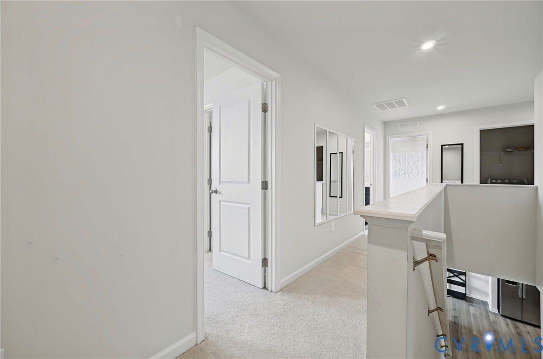 5713 Bison Ford Court, Chesterfield, VA 23234 Carpeted hallway with white walls and recessed lighting