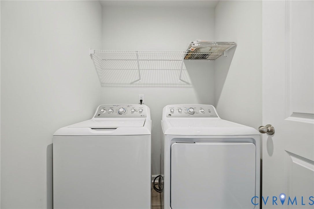 5713 Bison Ford Court, Chesterfield, VA 23234 Dedicated laundry area featuring a white washing machine and a white dryer